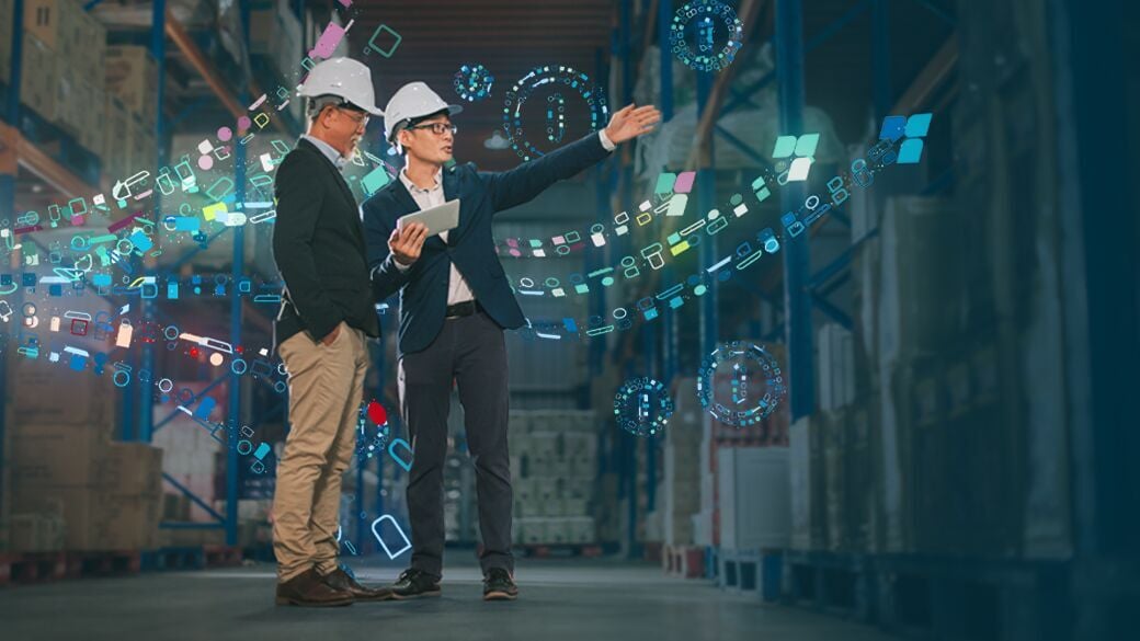 Two warehouse managers using Epicor Prophet 21 ERP software, visually illustrating streamlined inventory management and operational efficiency.